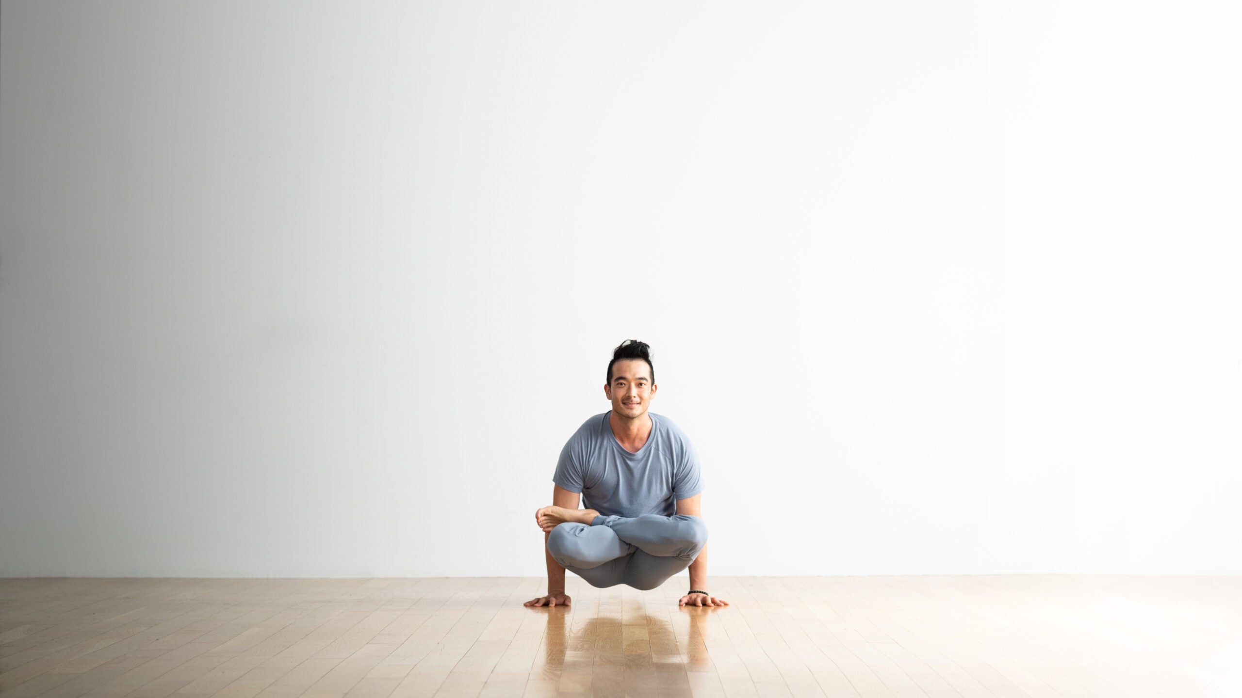 Full Length Pose Of Young Man Sitting On The Floor Cross Legged, Isolated  On White Background Stock Photo, Picture and Royalty Free Image. Image  18159150.