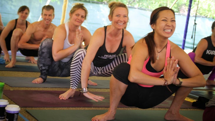 Laughter yoga, class in malasana Laughter yoga, class in malasana