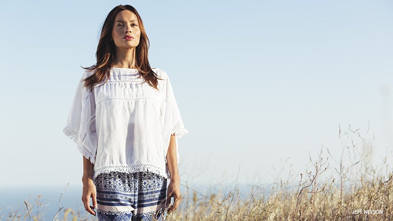 Woman Breathing in Field