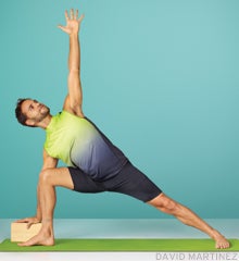 Man doing a Pincha Mayurasana yoga pose or Forearm Balance Stock Photo by  Photology75