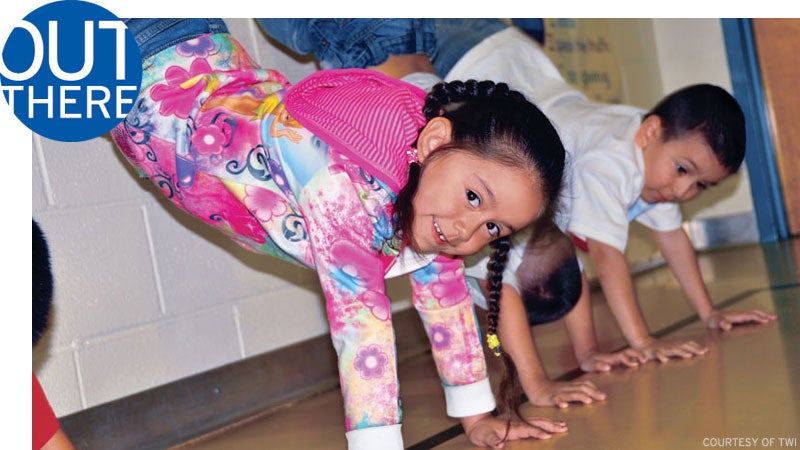 kids doing yoga in school