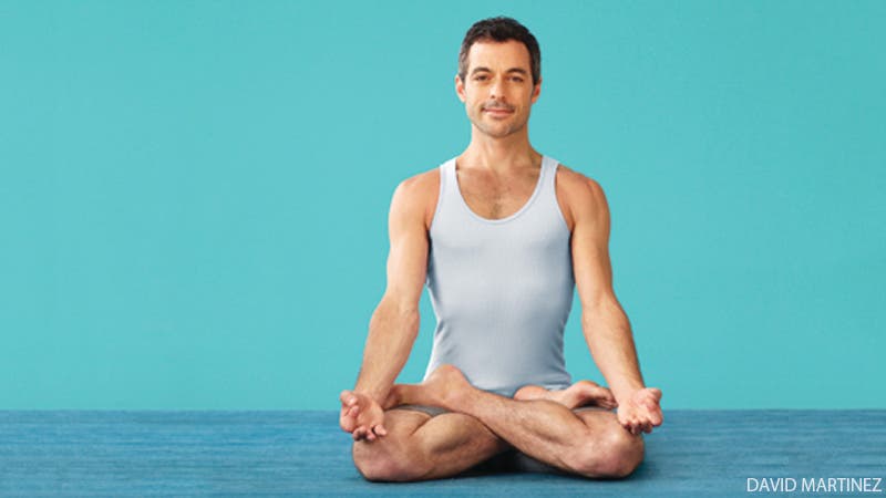 man doing yoga in padmasana lotus pose man doing yoga in padmasana lotus pose