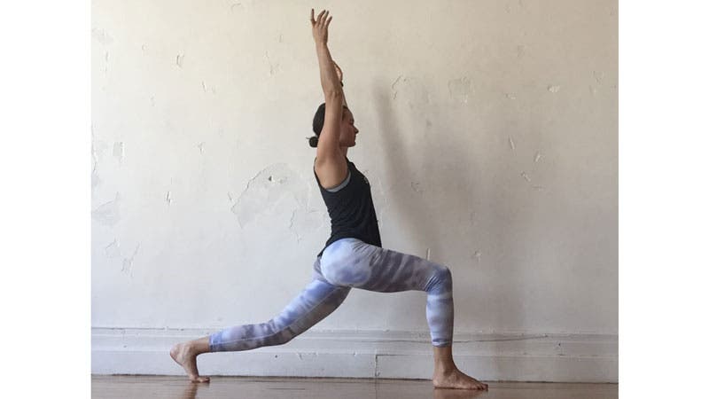 Rae Broderick in crescent lunge pose, anjaneyasana