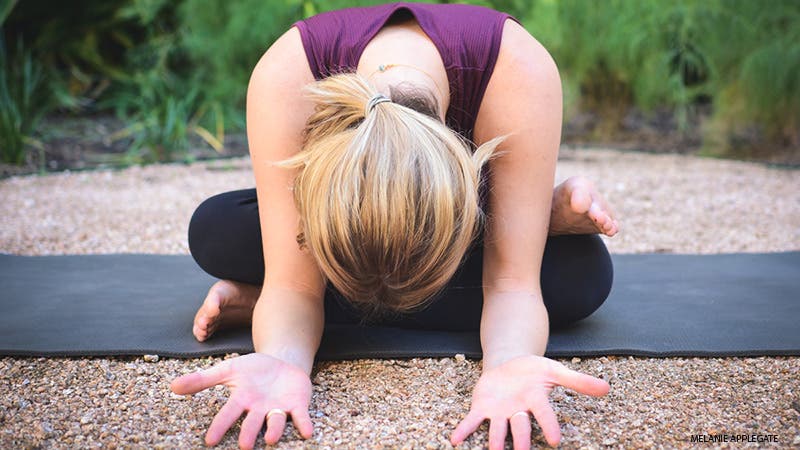Leah Cullis in Fire Log pose, agnistambhasana