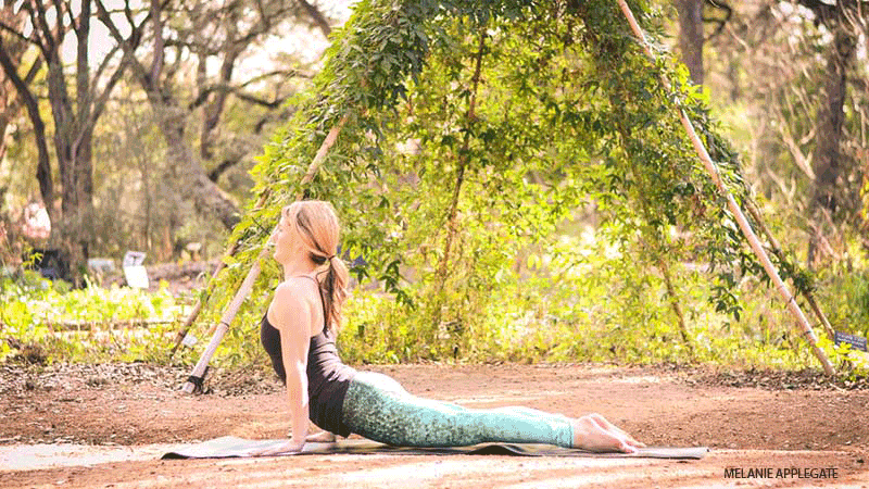Leah Cullis performs Upward-Facing Dog. Leah Cullis performs Upward-Facing Dog.