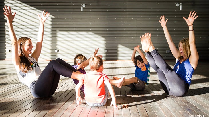 Leah Cullis and friends demonstrate Boat Pose. Leah Cullis and friends demonstrate Boat Pose.
