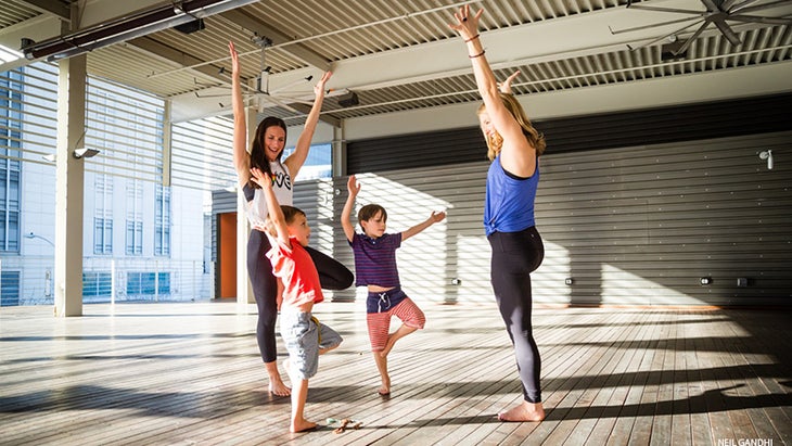 Leah Cullis and friends demonstrate Tree Pose. Leah Cullis and friends demonstrate Tree Pose.