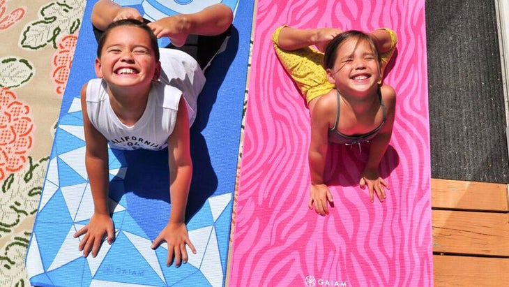 Laura Kasperzak's kids practice yoga on Gaiam yoga mats for kids. Laura Kasperzak's kids practice yoga on Gaiam yoga mats for kids.