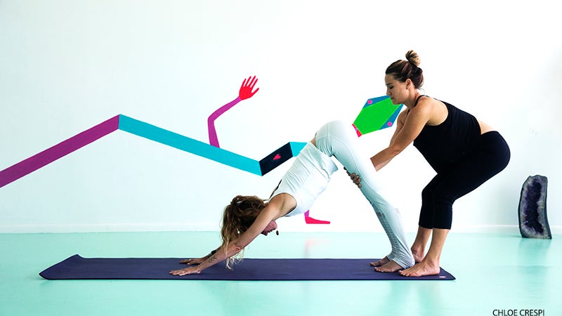 The Art of Adjustments: Understanding Physical Assists in Yoga