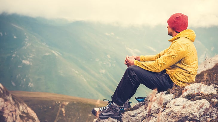 man meditating after hike, body sensing