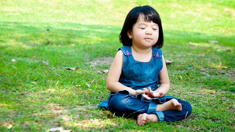child meditating child meditating