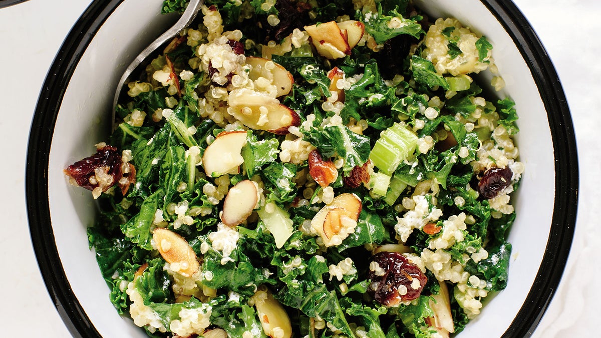 Kale and Quinoa Salad with Crisp Celery, Plumped Cranberries, and Lemon