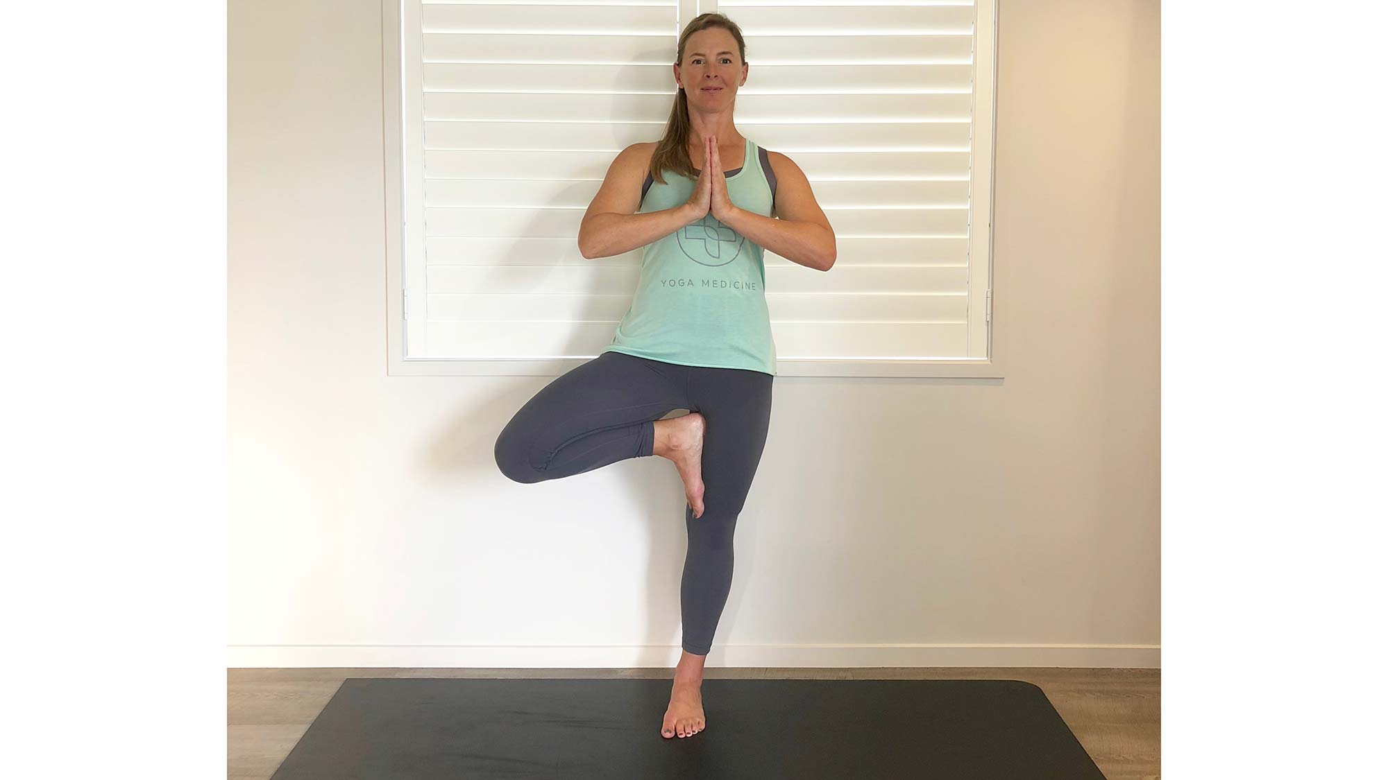 05-Tree woman in balance pose on one leg