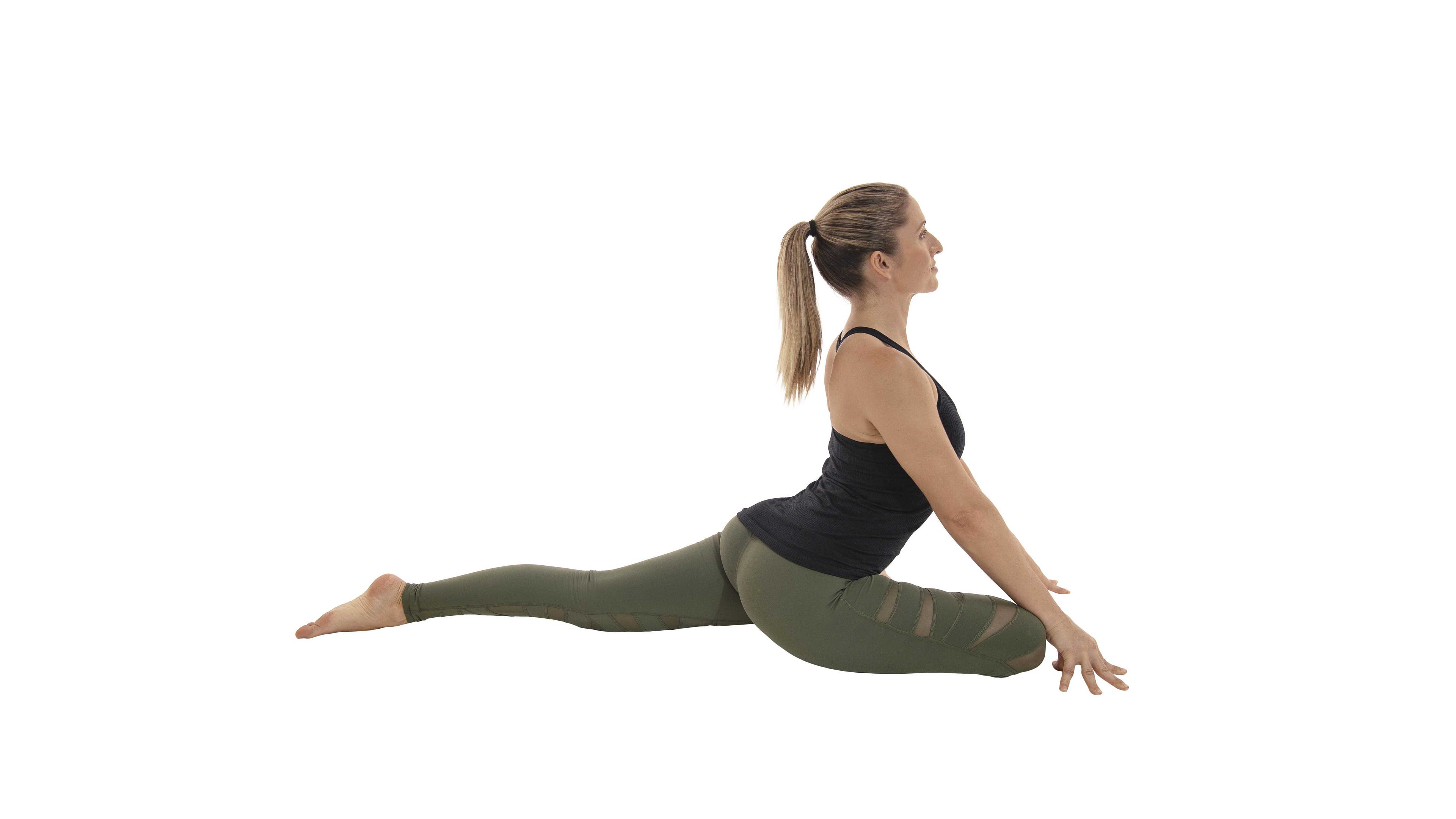 woman practicing eka pada rajakapotasana