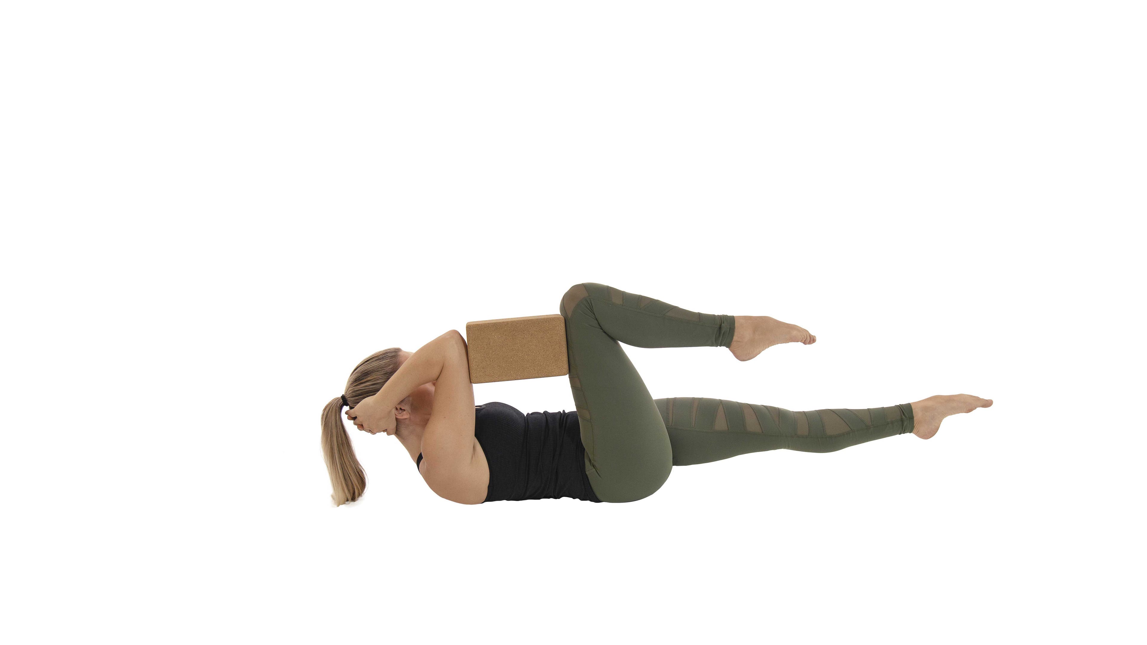 ElbowToKneeCoreWork woman practicing elbow to knee work