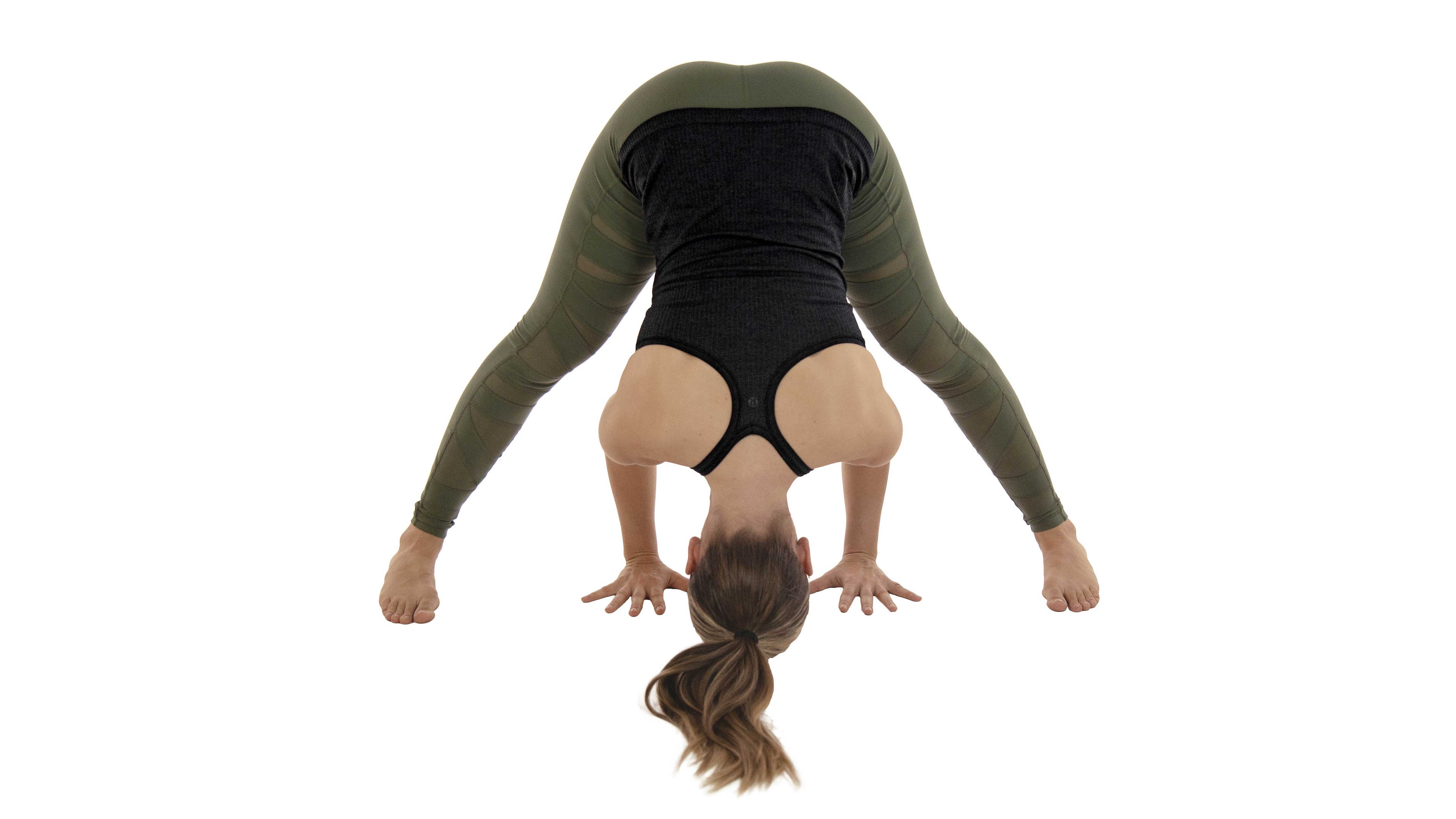 woman in prasarita padottanasana