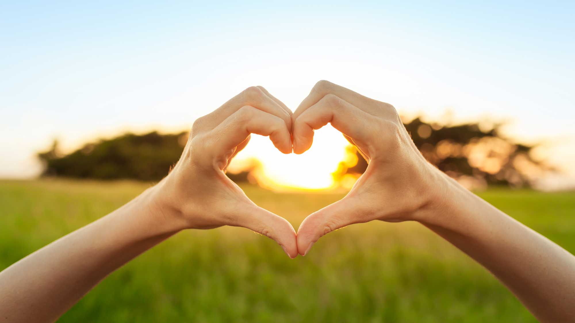 Self love with heart hands