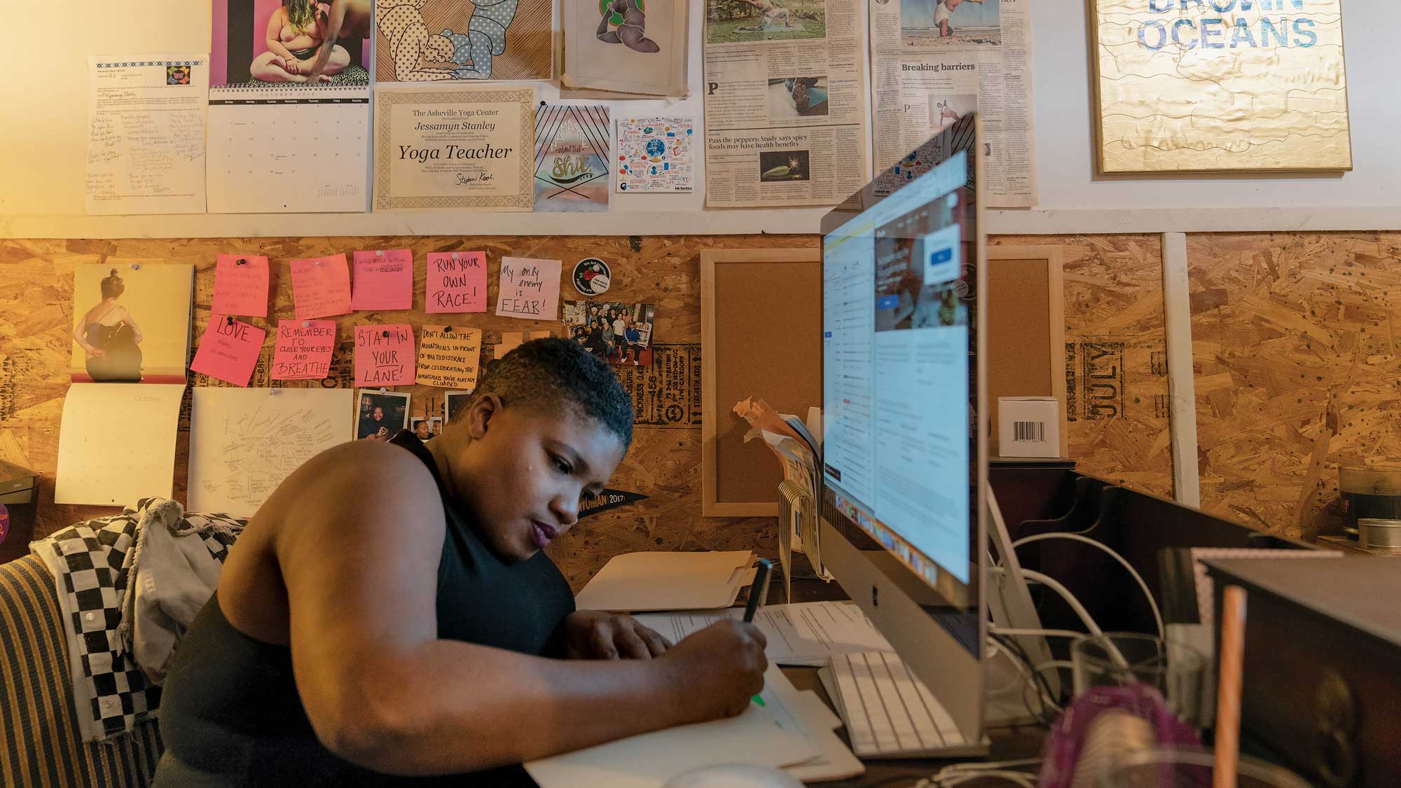 Jessamyn Stanley working at desk