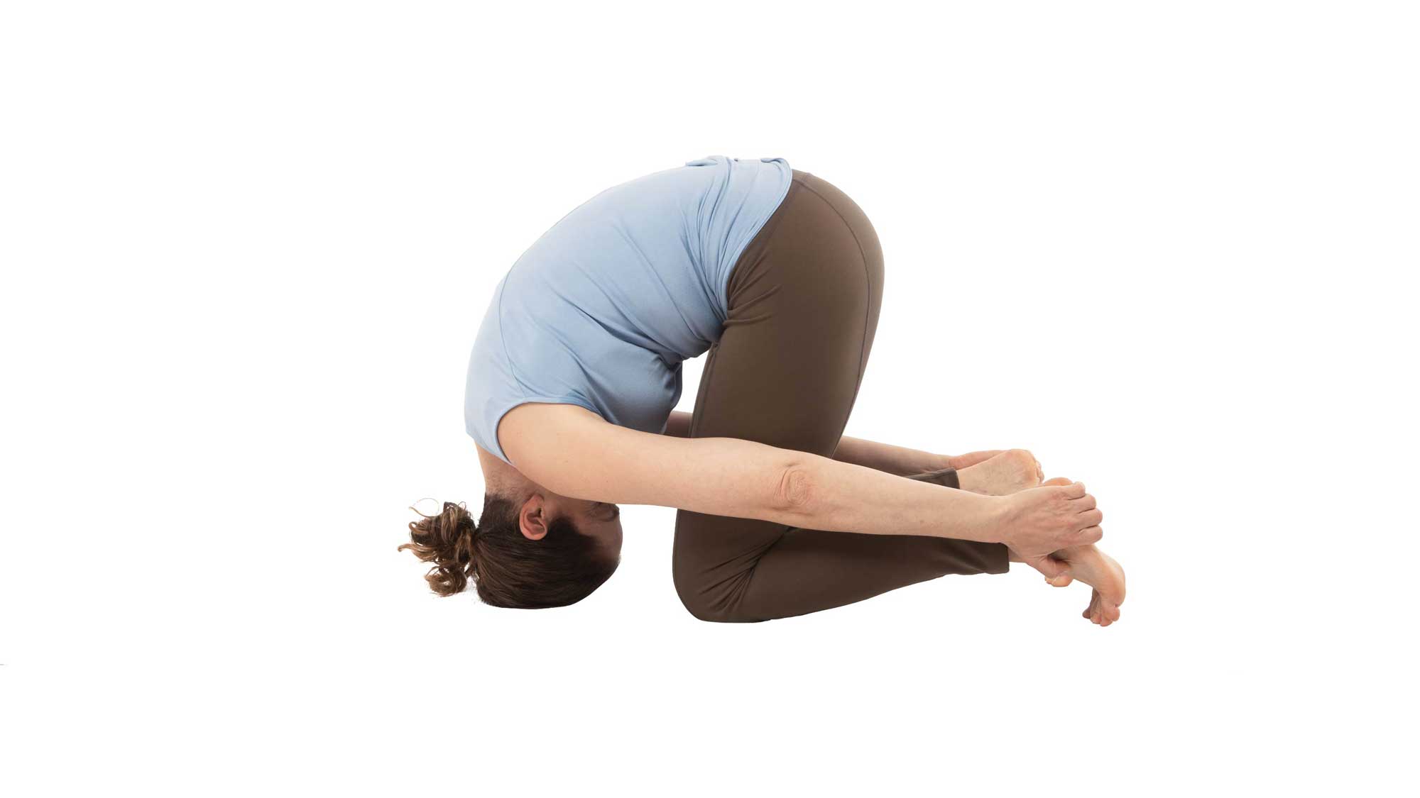 Young Woman Practicing Yoga Halasana Exercise Plough Pose Stock Photo -  Download Image Now - iStock