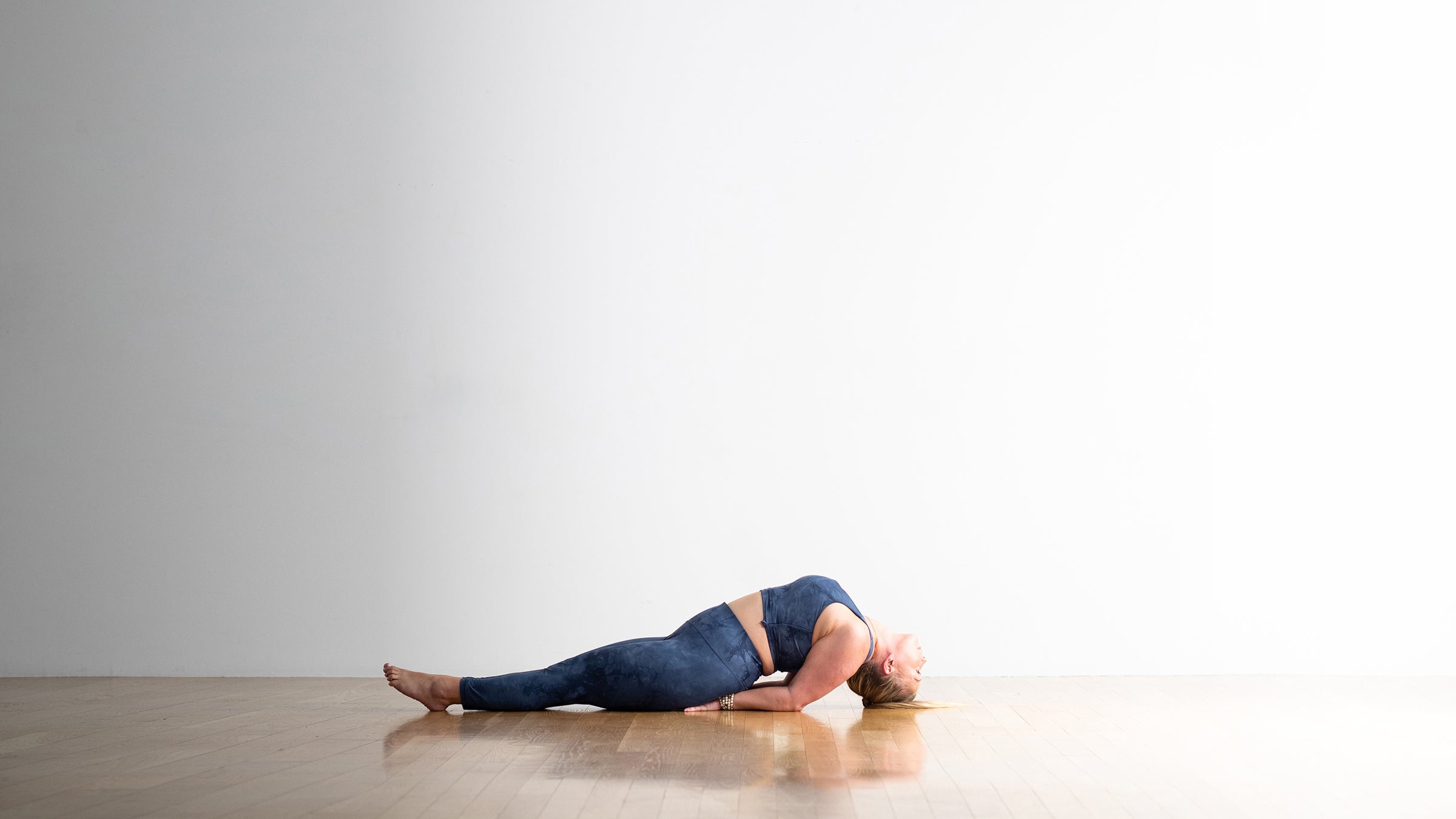 10 Yoga Poses For A Cold That'll Nurse Your Body Back To Health