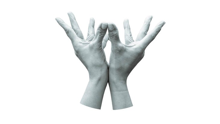 Isolated interlace fingers of both hands and extending up one finger  forming Linga Yoga mudra on white background. Horizontal shot. Stock Photo