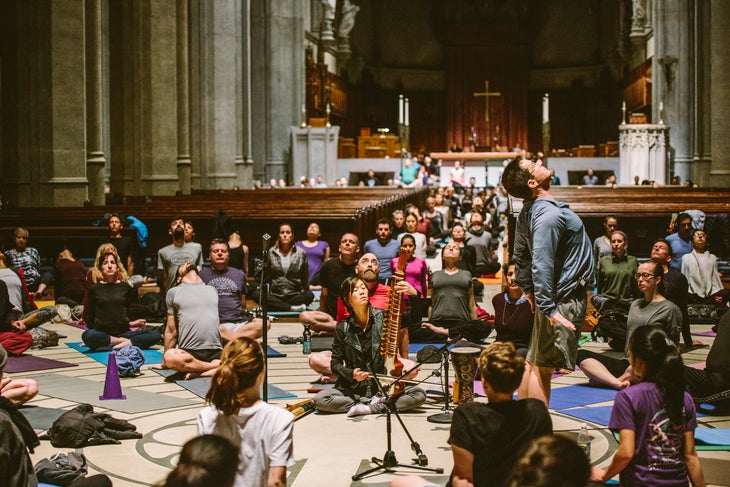 amberfield@gracecathedral_17 A diverse group of students practice yoga at Grace Cathedral