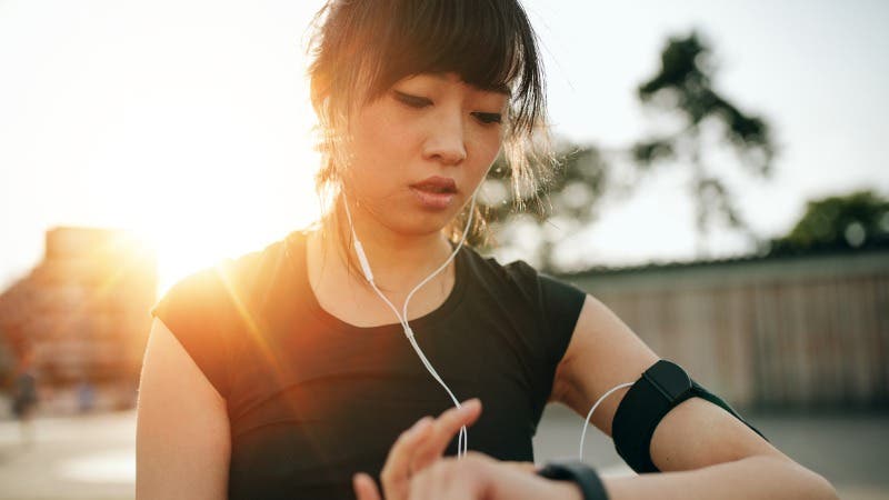 woman-monitoring-her-progress-on-smartwatch-picture-id621989682 None