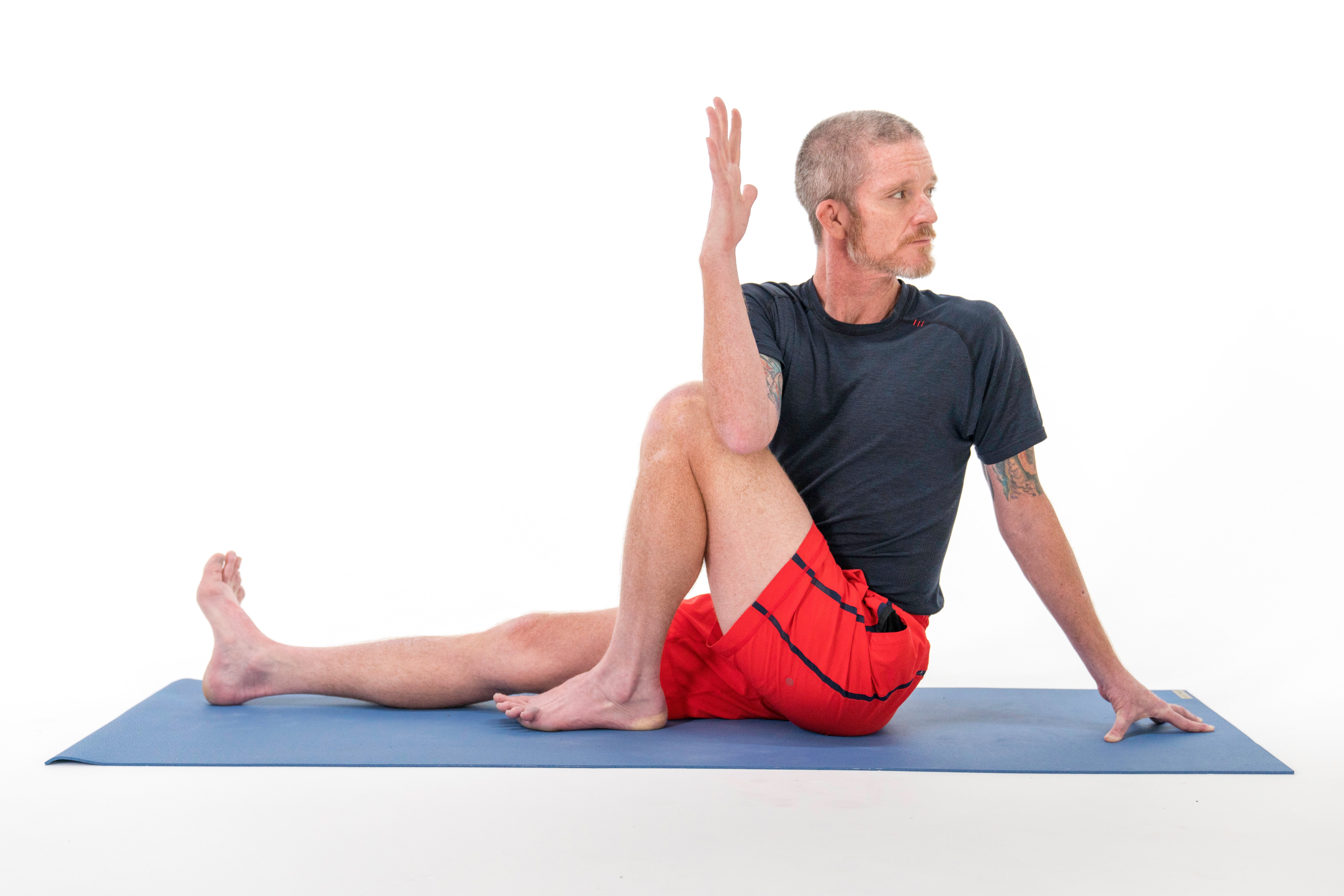 Say bye-bye to lower back pain with the seated-twist asana. Here's how you  can do it | HealthShots