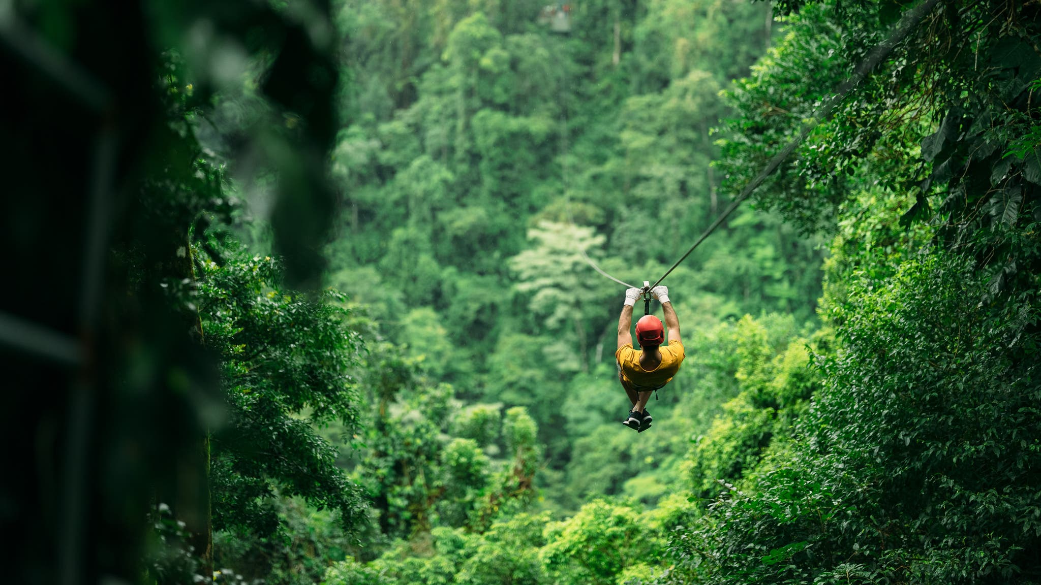 Person zip-lining in Costa Rica