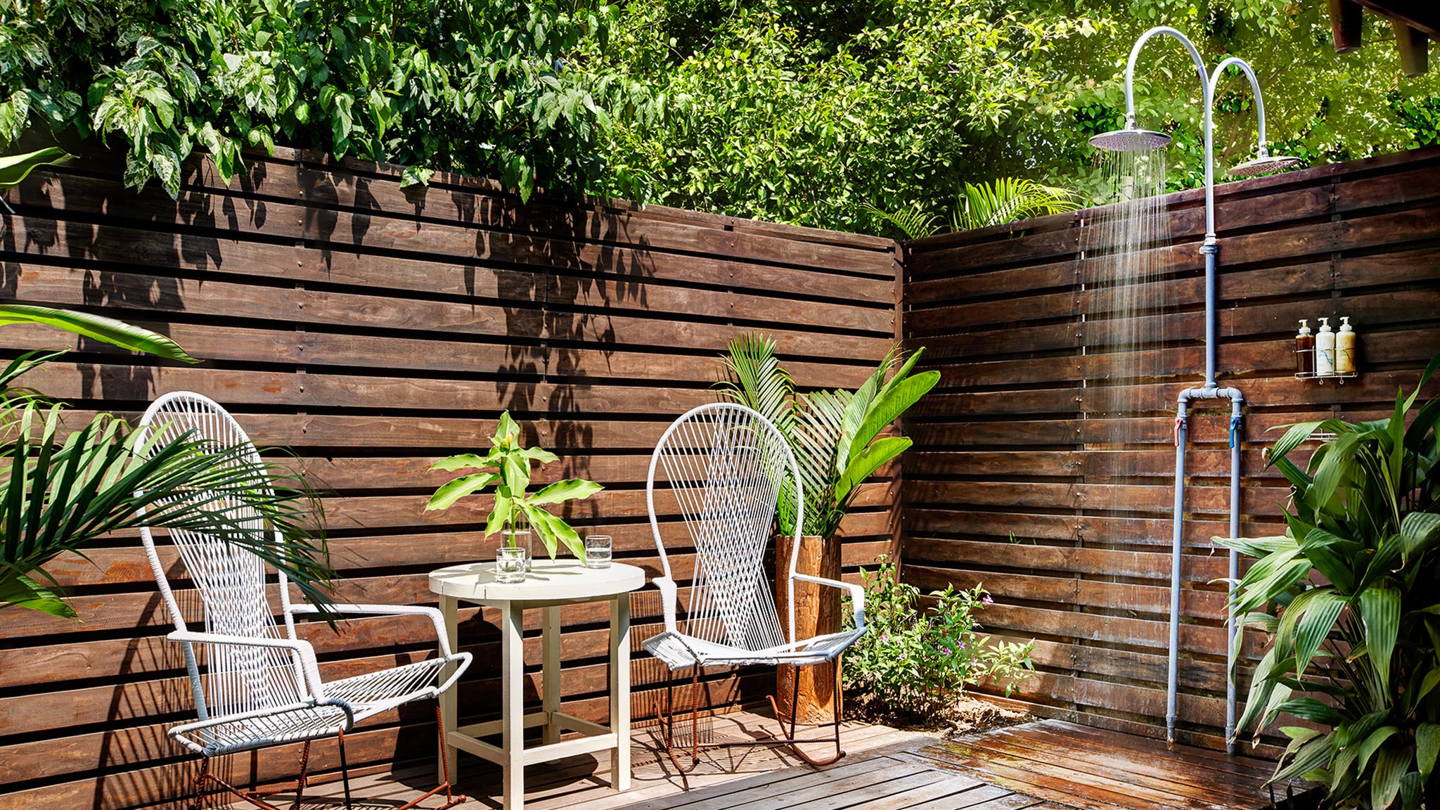 Outdoor shower with two chairs