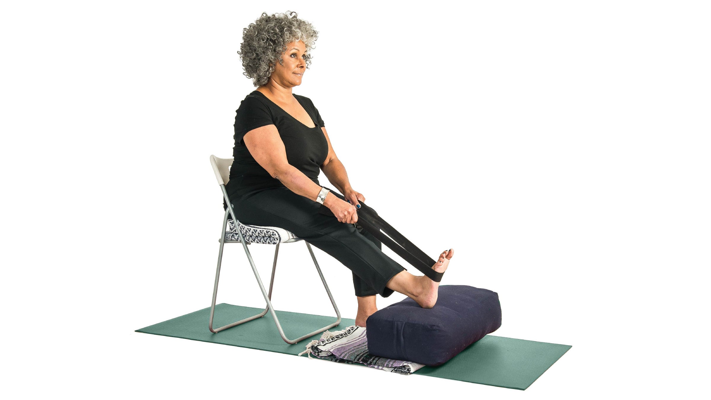 https://cdn.yogajournal.com/wp-content/uploads/2021/02/chair-leg-stretch.jpg