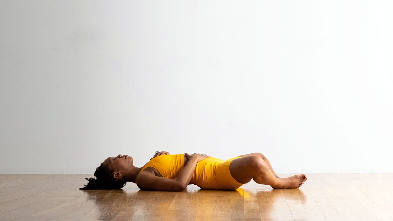 Reclining Big Toe Pose | Supta Padangusthasana - Yogapedia