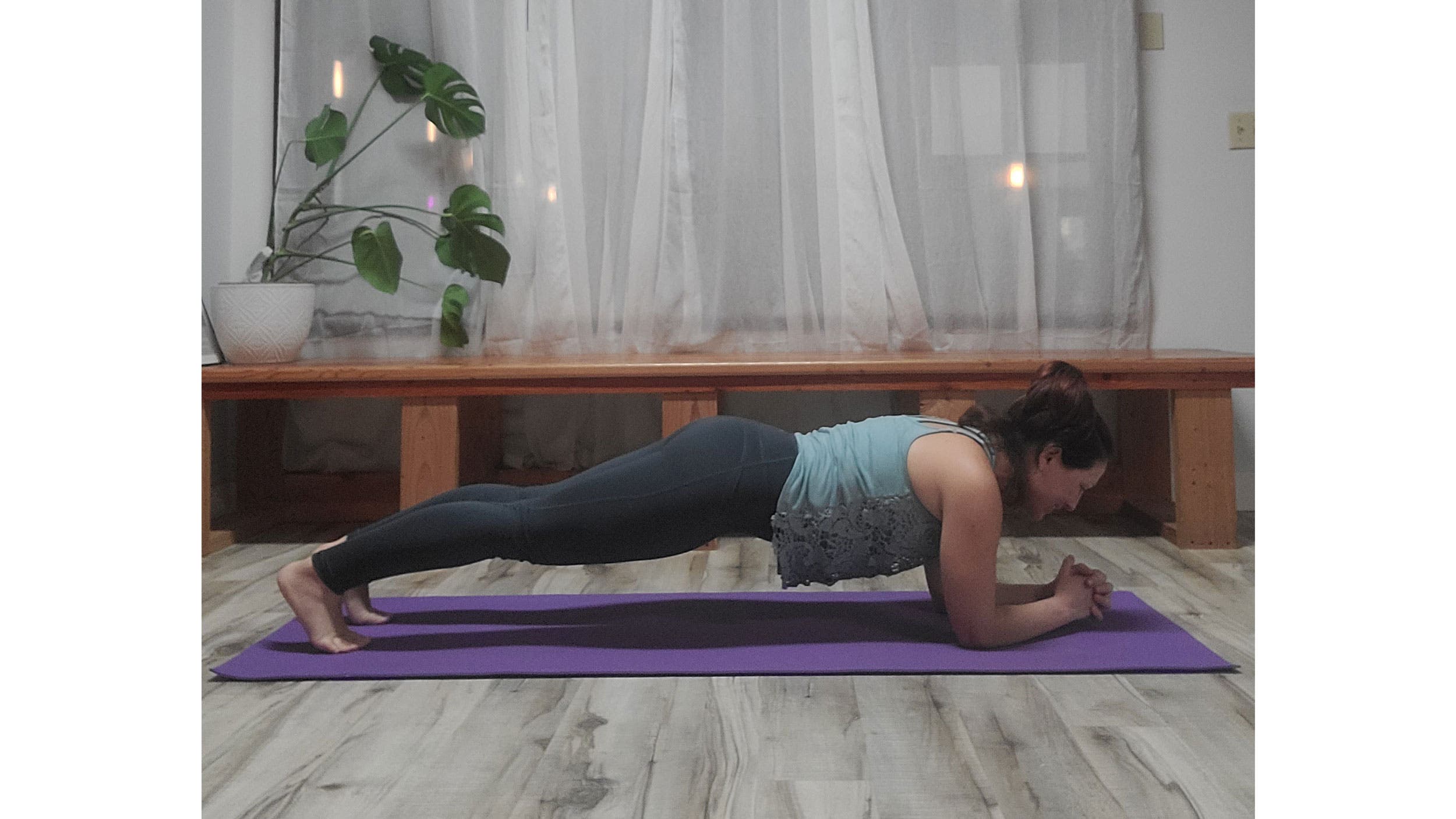 A person performs Forearm Plank 