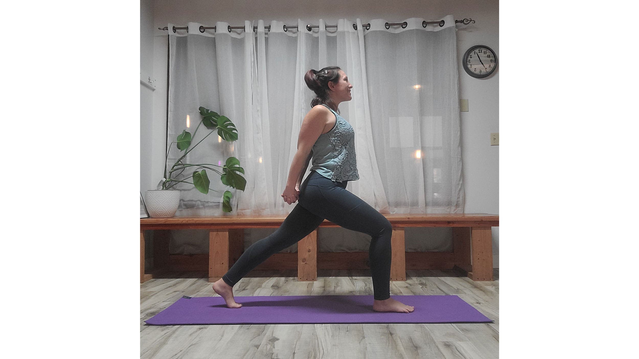 A person performs High Lunge variation in yoga