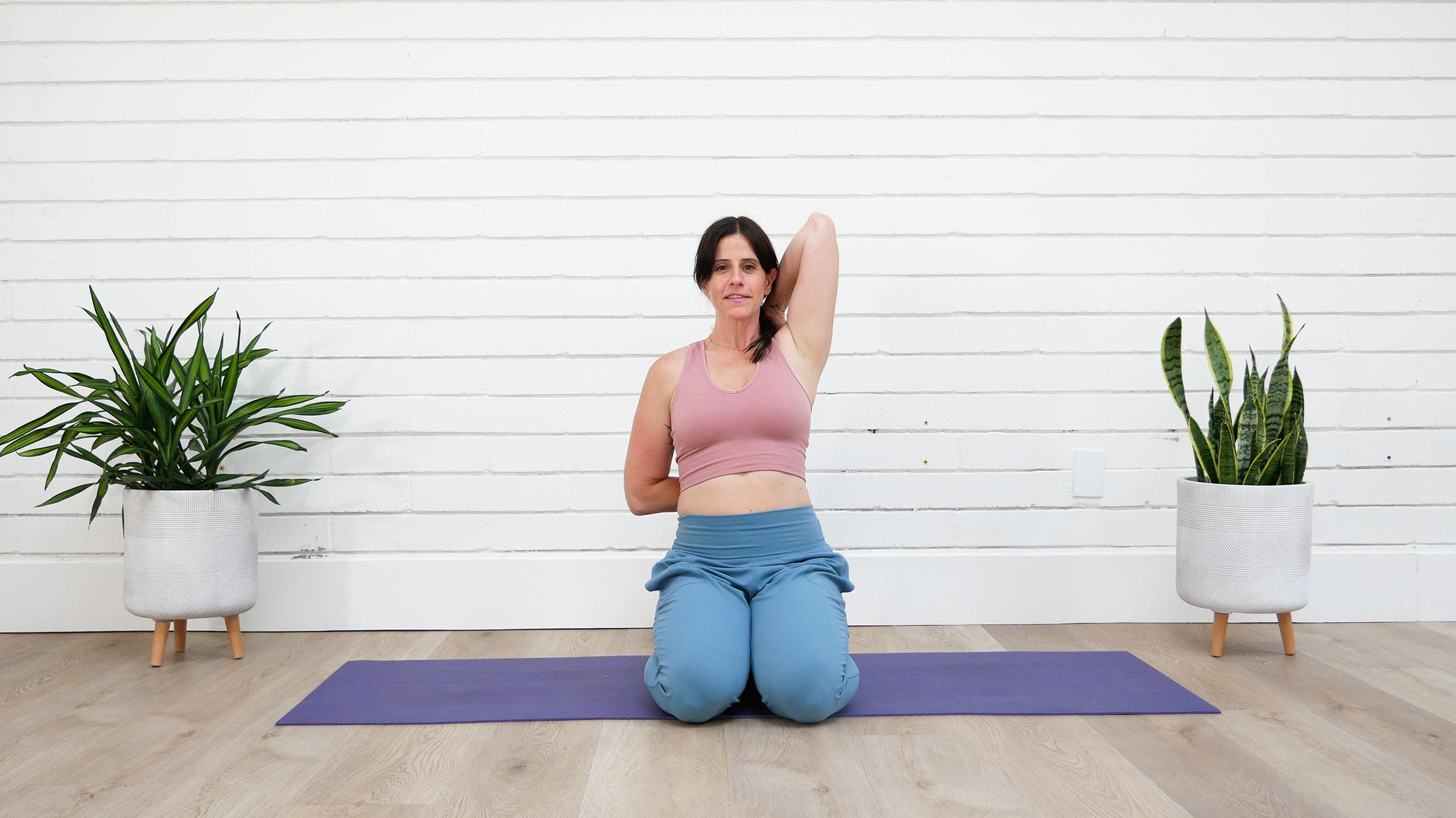 Virasana (Hero Pose) with Gomukhasana arms