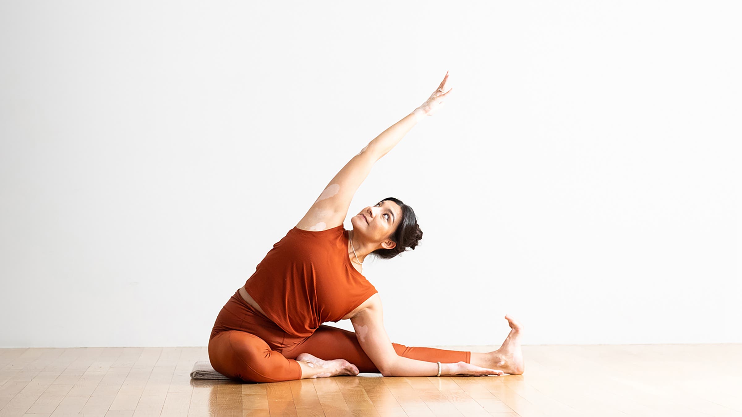 Woman in Gentle Revolved Head-to-Knee Pose