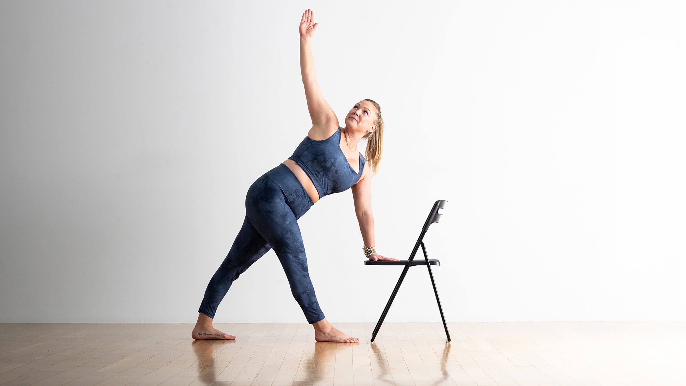 Premium Photo | Revolved triangle pose block.yoga posture