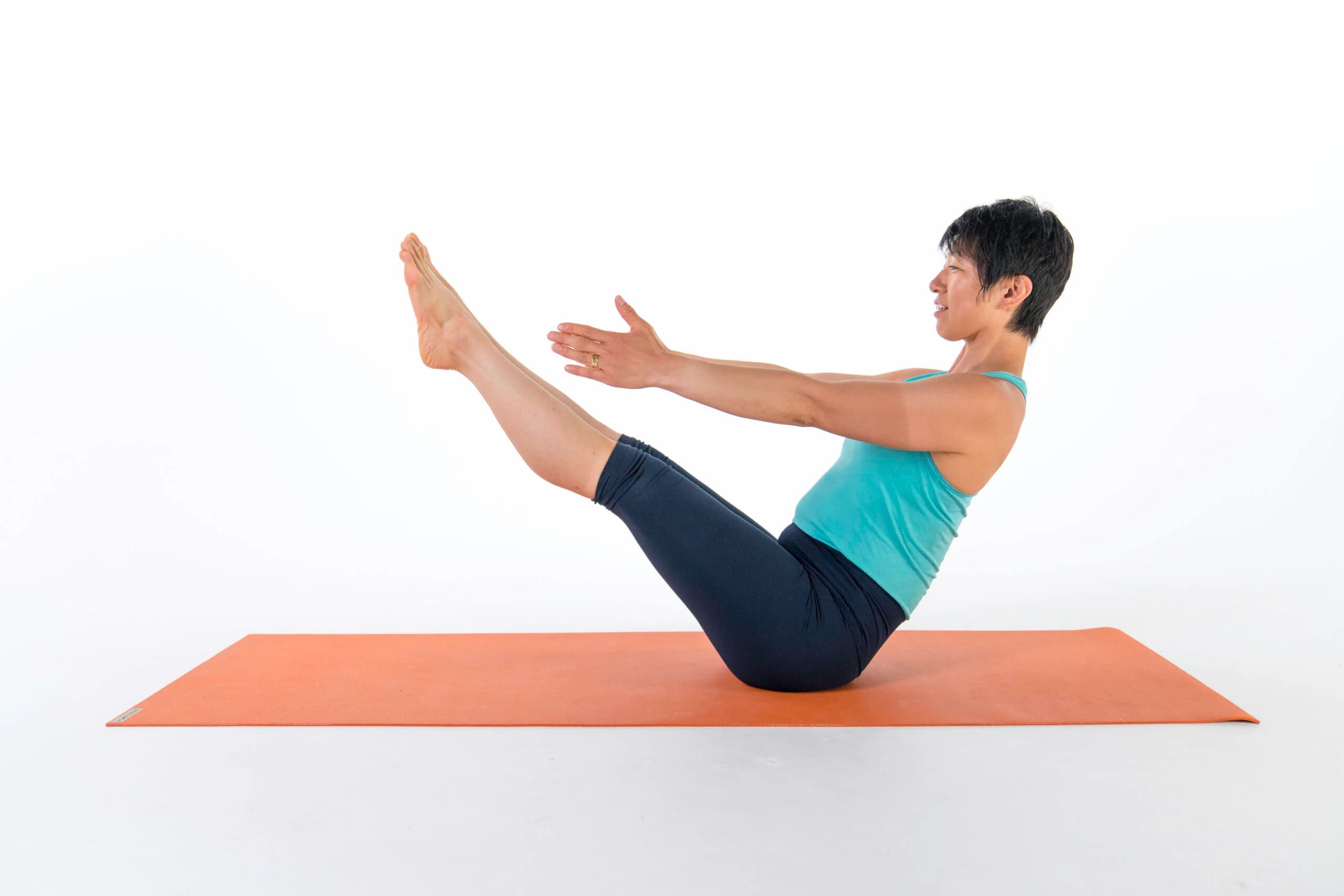 Woman demonstrates Boat Pose