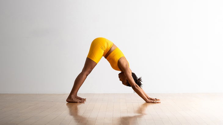 Should You Walk The Feet In For Downward Dog? - Yoganatomy