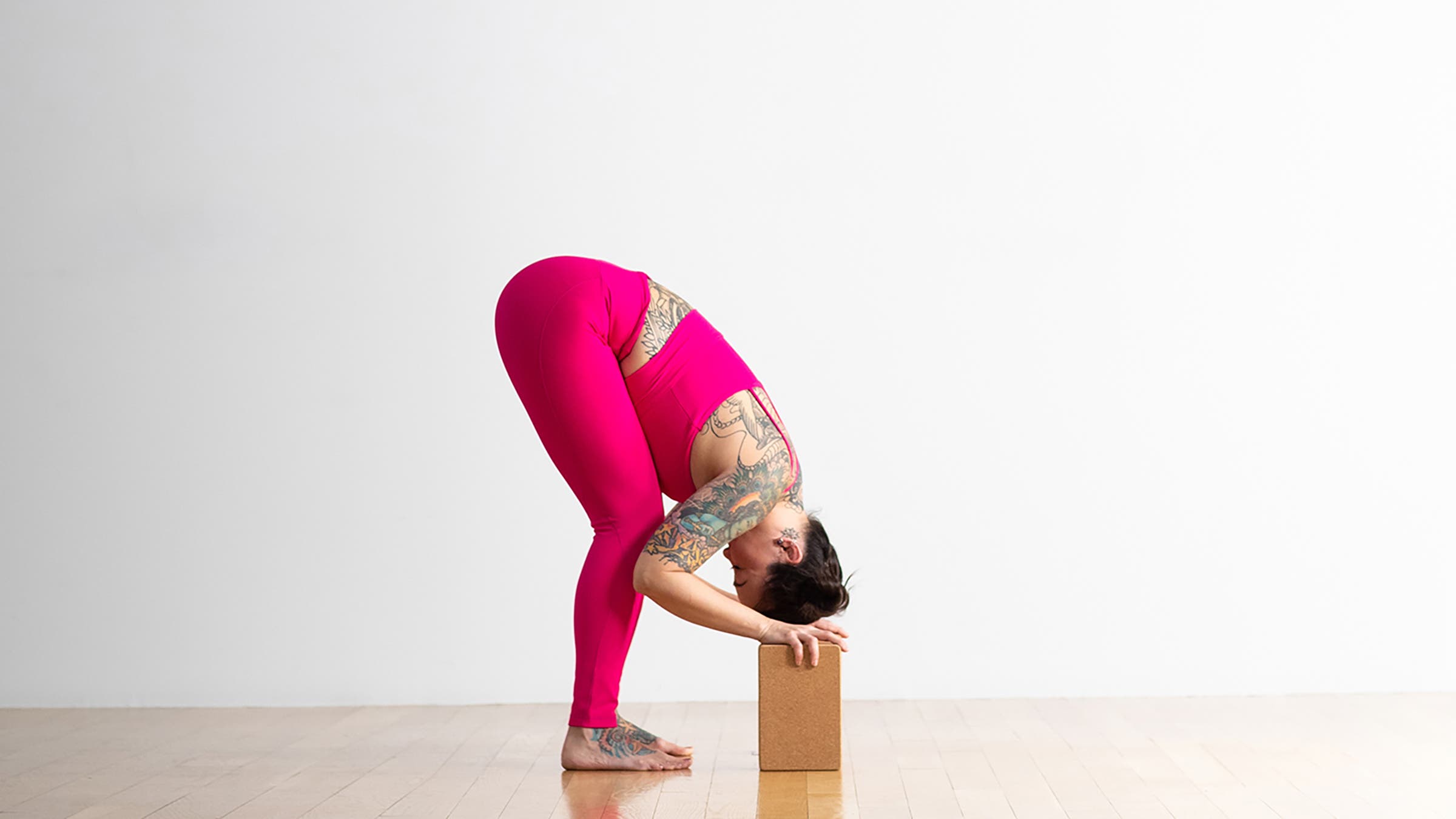 A person in a Half Standing Forward Bend