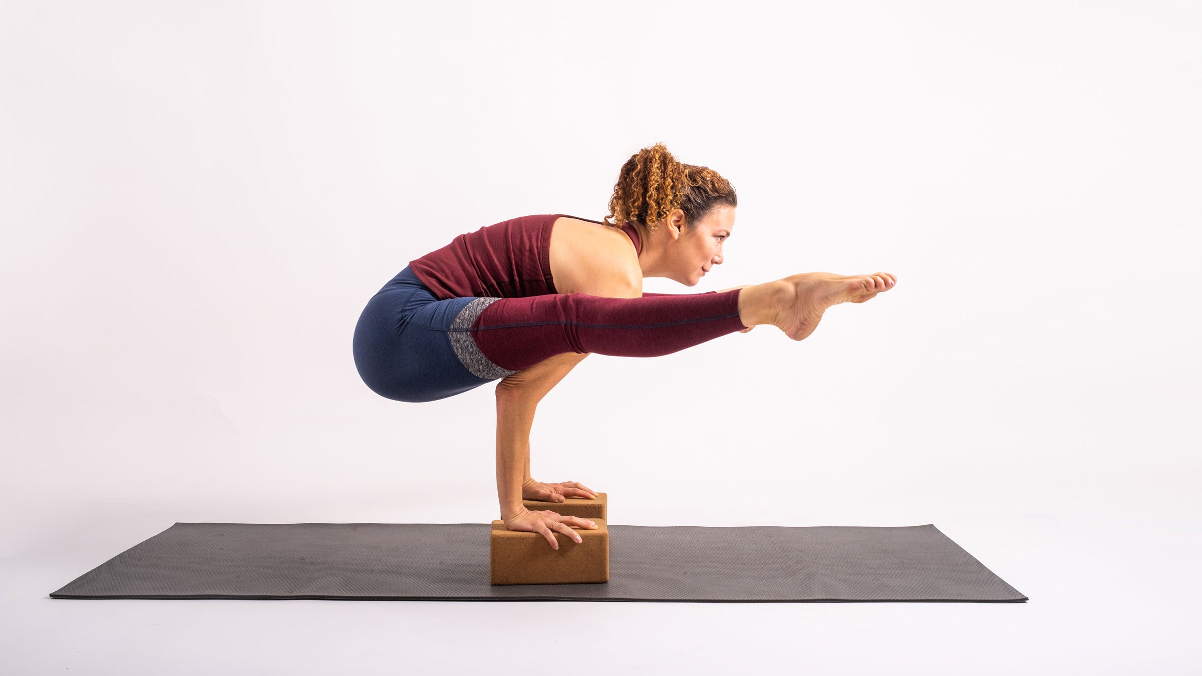Premium Photo | Beautiful woman practices handstand yoga asana tittibhasana  - firefly pose at the yoga studio