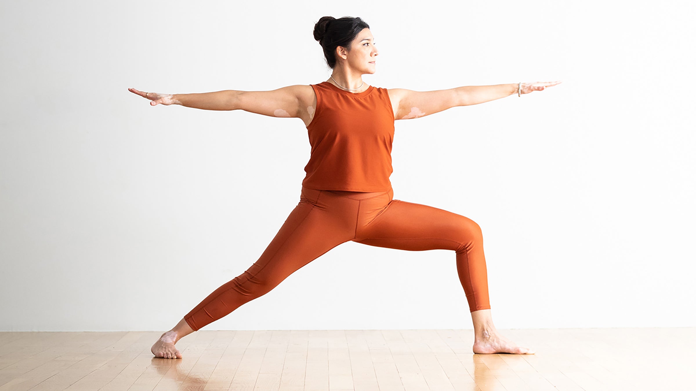 These 5 Standing Yoga Poses for Core Strength Take Only 15 Minutes