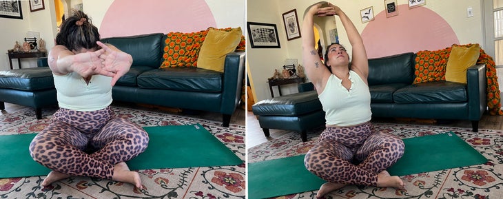 A person practices a seated Cat-Cow posture in yoga