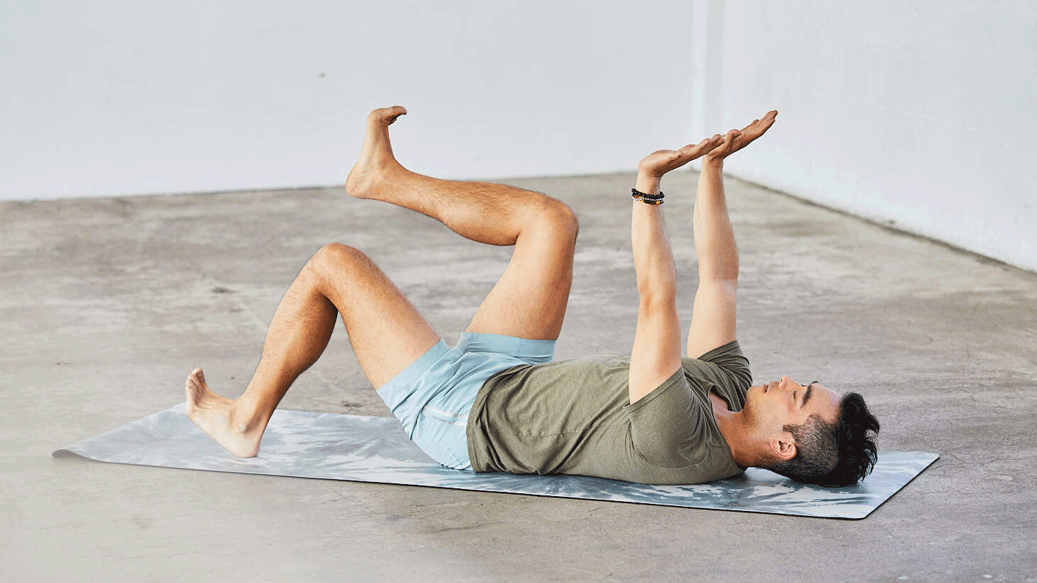 A moving image shows someone demonstrating Dead Bugs for the low back