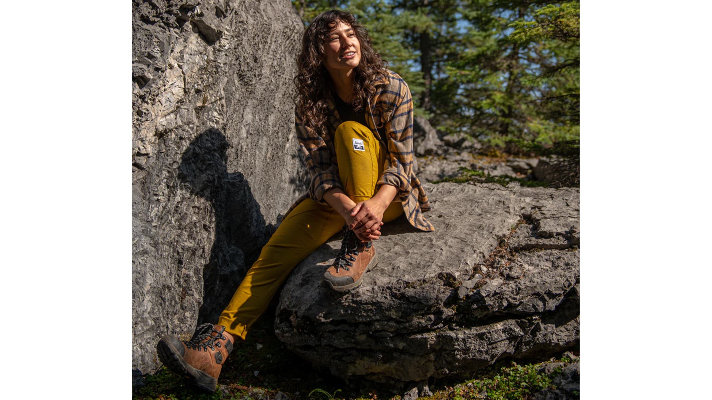 Woman wearing mustard-yellow pants