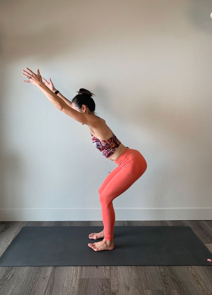 https://cdn.yogajournal.com/wp-content/uploads/2022/05/chair-pose-knees-aligned-with-ankles-scaled.jpg?width=730
