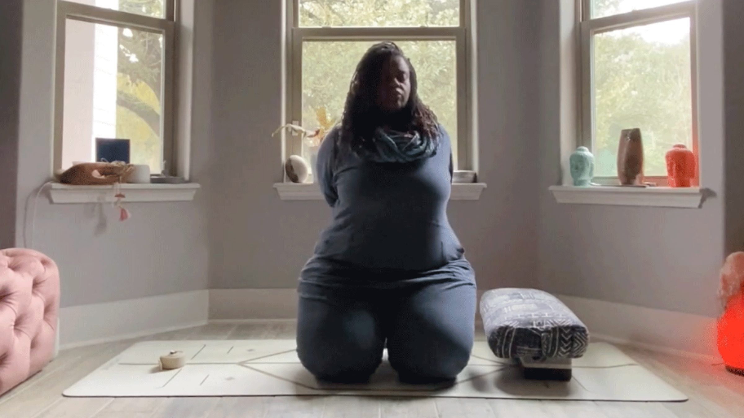 Woman stretching toes in her bedroom