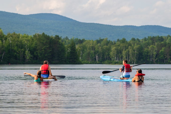 people paddle boarding in vermont