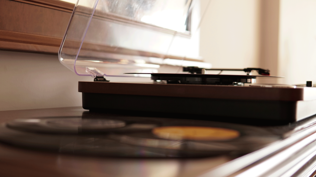 Old-fashioned record player with the needle on the LP