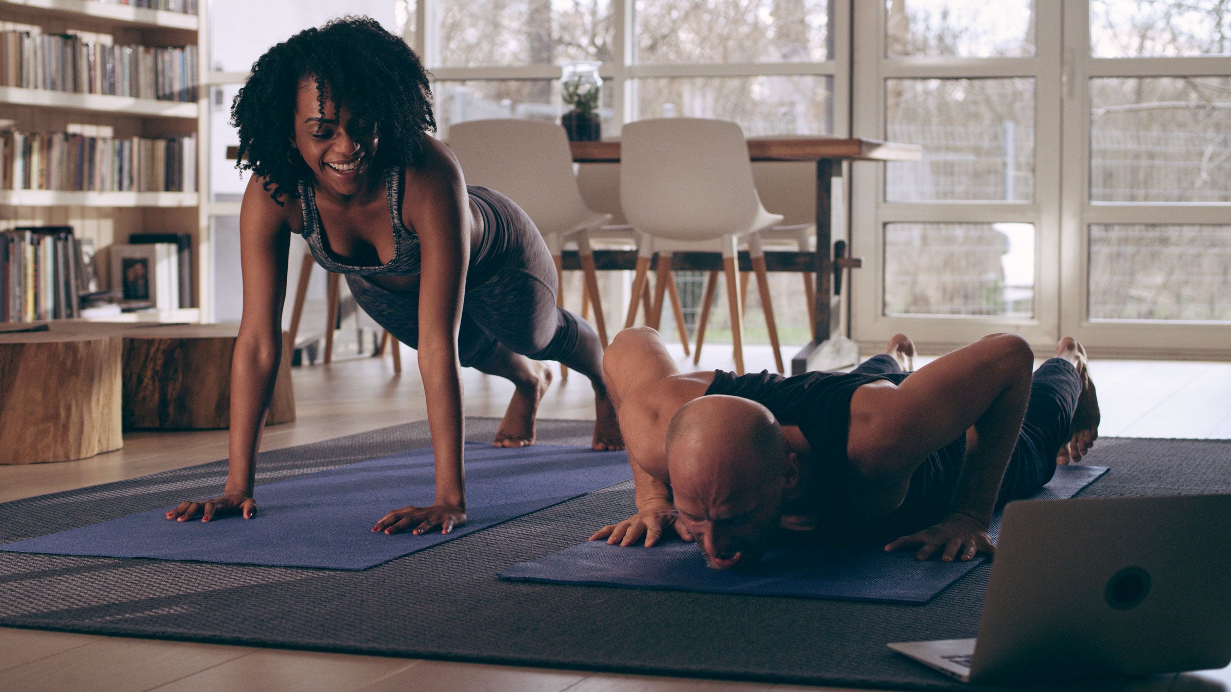 A couple works out at home